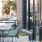 a table and chairs outside a building
