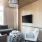 a living room with a tv and couches