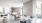 a modern living room with a large glass wall