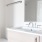 a bathroom with a sink toilet and mirror