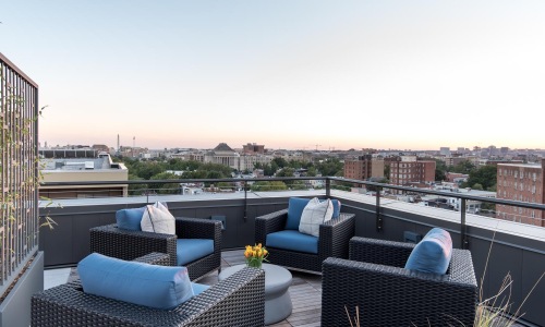 a balcony overlooking a city