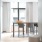 a room with a table and chairs