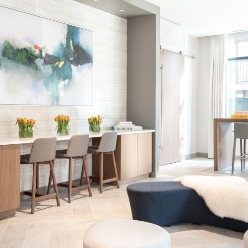 Enjoy our resident-only features a room with a table and chairs