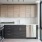 a kitchen with wooden cabinets