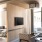 a living room with a tv and couches