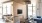 a living room with a tv and couches