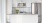 a kitchen with white cabinets