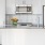 a kitchen with white cabinets