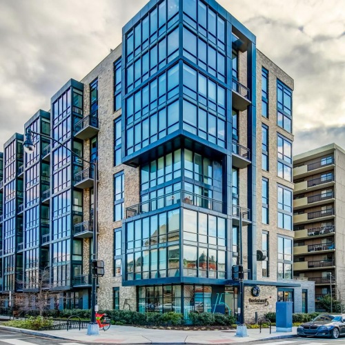 Settle into comfort at Berkshire 15 a building with glass windows